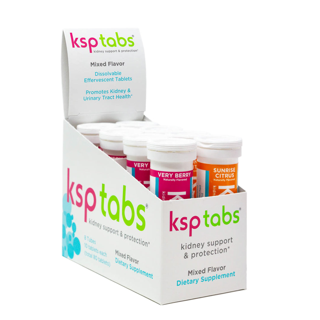 Display of ksptabs kidney support supplements with various flavors on a white background