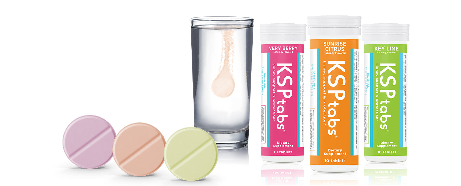 KSP Tabs packaging with colorful tablets and a glass of water on a white background
