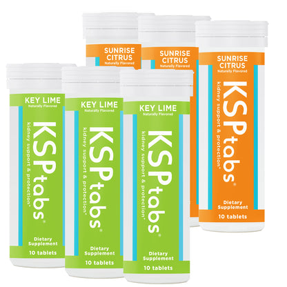 Multiple bottles of KSPTabs dietary supplements in different flavors on a white background